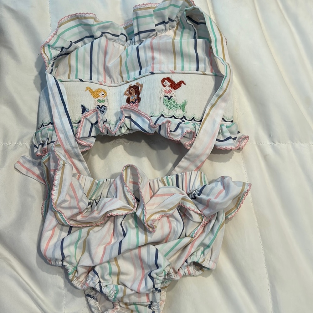 Girls 2 piece swimsuit. Adorable smock. Excellent condition